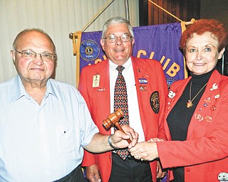 SPECIAL TO THE VINDICATOR
Lions and Lioness clubs of Austintown conducted their installation of officers recently at Rachel’s Restaurant in Austintown. Presiding was King Lion Larry Jensen. Past District Governor Bob Booher, from Canal Fulton Lions Club, served as the installing officer and presented Donald Hoelzel with the Melvin Jones Fellowship Award. From left are Bill Sywy, incoming president; Booher; and Lori Stone, incoming Lioness president. Other Lions officers are Bob Melcher, first vice president; Jack Kochansky, second vice president; Harold Wilson, secretary; Jensen, treasurer and Lioness liaison; Jim Banyots, tail twister; Hoelzel, lion tamer; Bob Whited, membership director and public relations; Glenn Ringer, two-year director; and John Facemyer, one-year director. Lioness officers include Lou Skerkavich, vice president; Teresa McCallen, secretary; and Jane Grace, treasurer. Melcher also was honored as Lion of the Year. 
