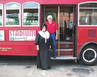 SPECIAL TO THE VINDICATOR:
Salem Historical Society, using the Quakertown Trolley, will offer trolley tours of Salem’s Underground Railroad homes. Preparing to welcome passengers aboard the trolley are Norm Casto, trolley driver, and Jeanne Martinelli, docent of Salem Historical Society’s Freedom Hall and the show presenter. Tours are scheduled for 1:30 p.m. Sunday and 10 a.m. and noon Aug. 10. Tours will last about 75 minutes and will cost $10 per person. Reservations are encouraged by calling 330-337-6733 and leaving a message. After the tour, passengers can view the Freedom Hall for an additional $2 per person.
