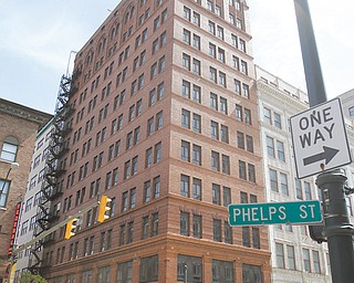 Developers plan a $15 million renovation of the vacant Wick Building on West Federal Street for a 52-unit rental and extended-stay facility.