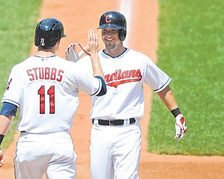 Cleveland Indians right fielder Ryan Raburn, right, celebrates his two-run home run with center fielder
Drew Stubbs against the Chicago White Sox in the third inning of a game Thursday in Cleveland.