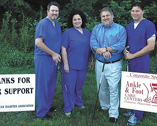 SPECIAL TO THE VINDICATOR
Ankle & Foot Care Centers of Boardman will sponsor its 15th annual golf benefit for the American Diabetes Association on Aug. 23 at Pine Lakes Golf Club in Hubbard. Members of the Ankle & Foot Centers, from left, are Dr. Gregory Blasko; Dr. Michelle Anania; Michael Vallas, practice administrator; and Dr. John Chiaro. Registration begins at 7:30 a.m. with a shotgun start at 8:30. The event includes 18 holes, a continental breakfast, lunch and dinner, refreshments on the course, prizes and skills competitions. The format is a four-person scramble and the fee is $100 per player. Deadline for registration is Aug. 16. Event sponsorships are available for $125 for a custom-made sign with company logo displayed near a golf hole, or $300 includes special recognition at the registration area and dinner pavilion and a corporate sponsor sign. To register or sponsor the event, call Anania at 330-270-2700 or Vallas at 330-629-8800.