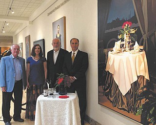 SPECIAL TO THE VINDICATOR
Planning the Butler’s Aug. 24 Art of Wine event are, left to right, Dan Tidrick, Butler board president; Renée Sheakoski, museum gift shop manager; Vincent Bacon, Butler trustee; and Tom Cavalier, managing director of Stifel Nicolaus.