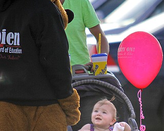 MADELYN P. HASTINGS | THE VINDICATOR..Sydnee Carpenter, 1, of Austintown smiles at the 'Jim Sobien for Austintown Board of Elections' dog at the Austintown National Night Out in the Austintown Township Park on August 6, 2013. This is the first year Austintown participated in the National Night Out hosted by the police department and the trustees. ... - -30-..