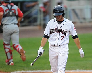 Scrappers batter #7 Josh McAdams  walks back to the dugout after striking out to end 4th inning. Lowell catcher #23 Danny Bathea