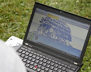 MADELYN P. HASTINGS | THE VINDICATOR
Shown are the results of a 3-D scan of the eroded tombstone of George Foulkes. Matt O’Mansky is using the scanner to try to make out the words on the tombstone in the Glenview Cemetery in East Palestine. O'Mansky was contacted by Jerry Ward, who is a descendant of Foulkes. Foulkes was captured by Indians as a young boy in 1780 and remained a captive for 11 years before escaping.