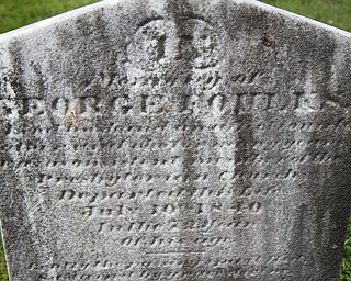 MADELYN P. HASTINGS | THE VINDICATOR
The tombstone of George Foulkes in the Glenview Cemetery in East Palestine. Matt O’Mansky is using a 3-D scanner to try to make out the words on athe tombstone. O'Mansky was contacted by a descendant of George Foulkes, who the tombstone is dedicated to. Foulkes was captured by Indians as a young boy in 1780 and remained a captive for 11 years before escaping.