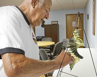 ROBERT K. YOSAY | THE VINDICATOR
Ed Gabrick builds a whirly jig Senior Independence Adult Day Care 1393 Boardman Canfield Rd is the new digs for the people who used to be clients at the Mahoning County Adult Day Care Program.