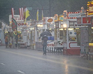 MADELYN P. HASTINGS | THE VINDICATOR
Rain and flooding delayed the Warren Italian Festival on Thursday, August 8. The festival runs through Sunday.