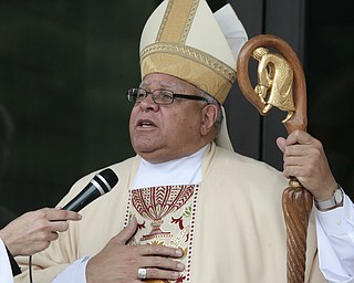 ROBERT K. YOSAY | THE VINDICATOR
Bishop Murry at the opening and blessing of the new hall
St Dominic's New Parish Center was officially opened today on Southern Blvd. It coincided with the 90th birthday of the church and presided over by Bishop george Murry