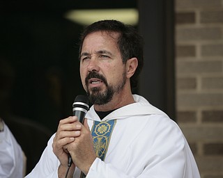 ROBERT K. YOSAY | THE VINDICATOR
Father Greg Maturi at the opening and blessing of the new hall
St Dominic's New Parish Center was officially opened today on Southern Blvd. It coincided with the 90th birthday of the church and presided over by Bishop george Murry