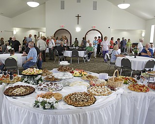 ROBERT K. YOSAY | THE VINDICATOR
St Dominic's New Parish Center was officially opened today on Southern Blvd. It coincided with the 90th birthday of the church and presided over by Bishop george Murry