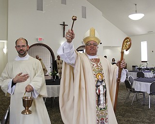 ROBERT K. YOSAY | THE VINDICATOR
Bishop Murry and Deacon John Ettinger bless the entrance
St Dominic's New Parish Center was officially opened today on Southern Blvd. It coincided with the 90th birthday of the church and presided over by Bishop george Murry