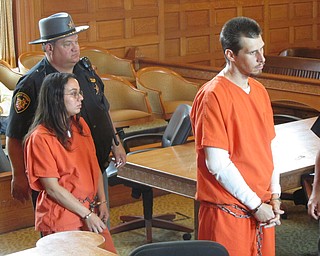  From left, Mindy Sierrra of Niles and Michael Burns of Mineral Ridge  
were arraigned Thursday in Trumbull County Common Pleas Court on  
charges of murder, attempted aggravated burglary, and involuntary  
manslaughter. The murder charge relates to the death of Terry Allen,  
who police say was shot to death by the occupant of a house on state  
Route 46 in Niles where Sierra, Burns and two other people went July  
12 to steal copper.