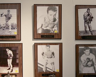 ROBERT K. YOSAY | THE VINDICATOR..unusual sports memorabilia-fmaous boxers..Larry and Ann Canale have been running an antiques business for more than five years. Their operation started from a small house in Columbiana, but has since expanded to a storefront there with 6,000 square feet. A feature on their business and how theyÕve managed to grow.--AnnÕs Attic Antiques & Furniture, Columbiana.... - -30-..