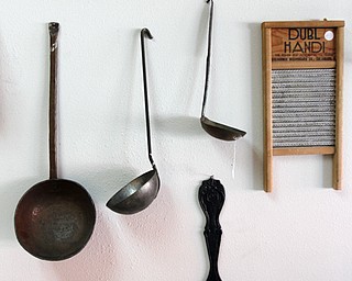 ROBERT K. YOSAY | THE VINDICATOR..kitchen utensils.Larry and Ann Canale have been running an antiques business for more than five years. Their operation started from a small house in Columbiana, but has since expanded to a storefront there with 6,000 square feet. A feature on their business and how theyÕve managed to grow.--AnnÕs Attic Antiques & Furniture, Columbiana.... - -30-..