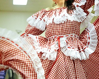MADELYN P. HASTINGS | THE VINDICATOR..Paulina Montaldo of Youngstown dances during the 2nd Annual International Latino Food Fest at the OCCHA Social Hall in Youngstown on Friday, August 9, 2013. ... - -30-..