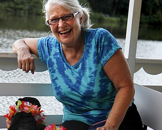 MADELYN P. HASTINGS | THE VINDICATOR..Andrea Jeric and her greyhounds Phoebe and Lyla enjoy a Yappy Hour paddle boat ride on Lake Glacier on Friday, August 9, 2013. ... - -30-..