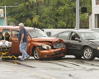 ROBERT K. YOSAY | THE VINDICATOR..a two car wreck friday morning at Southern Blvd and Midlothian sent two people to the hospital- YPD investiatged ... - -30-..