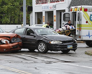 ROBERT K. YOSAY | THE VINDICATOR..a two car wreck friday morning at Southern Blvd and Midlothian sent two people to the hospital- YPD investiatged ... - -30-..