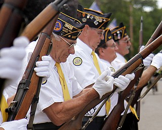 MADELYN P. HASTINGS | THE VINDICATOR..Vince Bellanca of Lowellville participates in a 21-gun salue honoring local veterans who died in combat during World War II and the Vietnam War. The dedication was part of Lowellville Day on Saturday, August 10, 2013 in downtown Lowellville. ... - -30-..