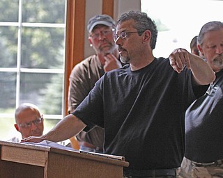 Founder of the Big Foot Research Group, Paul Hayes, talks about evidence of the existence of Sasquatch during a Big Foot Research Group meeting at the Leetonia Community Public Library in Leetonia on Saturday Morning. Dustin Livesay | The Vindicator 8/10/13 Leetonia Community Public Library.