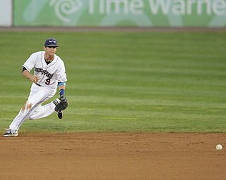 Scrappers second basemen #9 Paul Hendrix tracks down the ground ball before throwing the ball to first base for the 2nd out in the top of the 4th inning during a game between the Scrappers and Renegades on August 10, 2013.