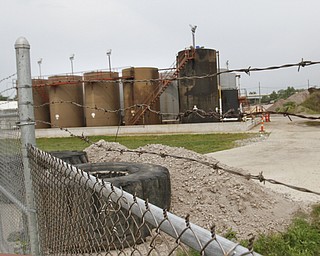 ROBERT K. YOSAY | THE VINDICATOR
D&L’s former Northstar One injection well site in Youngstown has sat unattended for months now. Some of the storage tanks still contain fracking waste to prevent them from blowing over and some members of Youngstown City Council are concerned about the rapidly deteriorating site