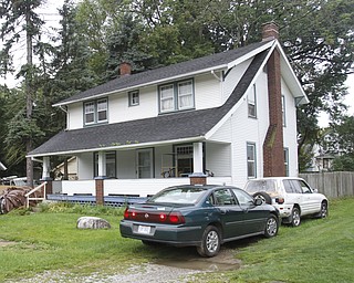 ROBERT K. YOSAY | THE VINDICATOR
Fellows Riverside Gardens is expanding through a grant and recently bought a house at 123 McKinley Ave, Youngstown, OH (white house) They are also expanding the Family Gardens