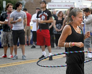 MADELYN P. HASTINGS | THE VINDICATOR
Brenda Lewis of Austintown spins a hula hoop at Vexfest 9 in downtown Youngstown on Sunday, August 11, 2013.
