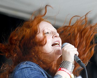 MADELYN P. HASTINGS | THE VINDICATOR
Susan Fletcher sings in the band Scarlet & the Harlots from Kent, Ohio at Vexfest 9 in downtown Youngstown on Sunday, August 11, 2013.
