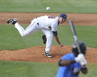 Scrappers starting pitcher #38 Michael Goodnight throws a pitch to Renegades batter #8 James Harris during an at bat int he top of the 5th inning during a game between the Scrappers and Renegades on August 1, 2013.