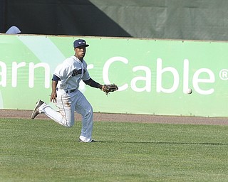 Scrappers outfielder #6 Joel Mejia chases down a baseball that was hit in the gap during a Renegades at bat in the top of the 5th inning during a game between the Scrappers and Renegades on August 1, 2013.