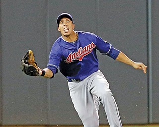 Cleveland Indians left fielder Michael Brantley eyes a shallow pop fly before making the catch on a ball hit by the Minnesota Twins’ Clete Thomas in the sixth inning Monday night.