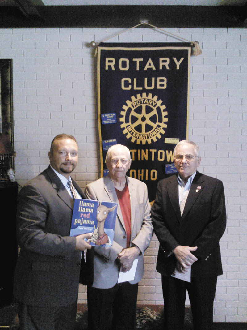 SPECIAL TO THE VINDICATOR
At a recent meeting of Austintown Rotary guest speakers, Jack Kidd and Larry Cadman, honored two Vietnam veterans. Sgt. James Prommersberger and Lt. Charles Brown, who died in Vietnam, were members of their graduating class in 1962 at Austintown. Kidd and Cadman also are Vietnam veterans. At the encouragement from their 50th class reunion, the two men raised funds for a memorial by making wooden ink pens from the wood on the gym floor of the old Fitch building. From left are Mark Cole, Austintown Rotary president; Cadman; and Kidd.