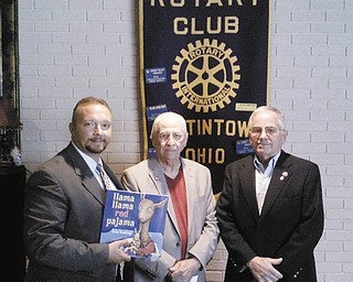 SPECIAL TO THE VINDICATOR
At a recent meeting of Austintown Rotary guest speakers, Jack Kidd and Larry Cadman, honored two Vietnam veterans. Sgt. James Prommersberger and Lt. Charles Brown, who died in Vietnam, were members of their graduating class in 1962 at Austintown. Kidd and Cadman also are Vietnam veterans. At the encouragement from their 50th class reunion, the two men raised funds for a memorial by making wooden ink pens from the wood on the gym floor of the old Fitch building. From left are Mark Cole, Austintown Rotary president; Cadman; and Kidd.