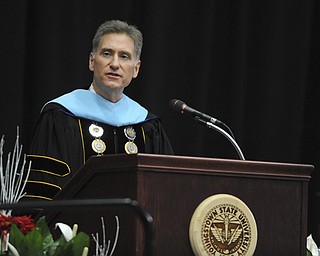 Youngstown State president Randy Dunn gives the opening remarks during the summer commencement ceremony Saturday morning at Beeghley Center.