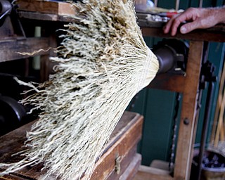 MADELYN P. HASTINGS | THE VINDICATOR
Straw Mountain Brooms was one of the many booths at the Shaker Woods Festival in Columbiana on Sunday, August 18, 2013.
