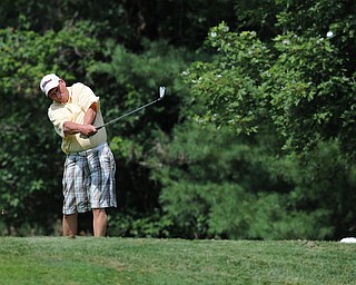 Dave Beitz of Poland tees off on the 12th hole Tuesday afternoon at the Trumbull Country club.