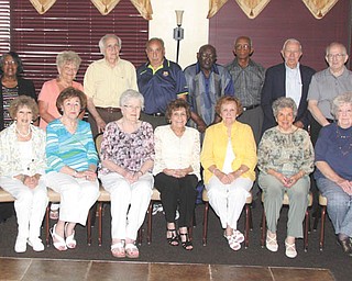 NICK MAYS l THE VINDICATOR 
The Rayen Class of 1948 hosted its 65th anniversary class reunion Aug. 7 at Johnny’s Restaurant in Boardman. Seated, from left, are Geraldine Lucarel Brennan, Julia Mele Palazzo, Nancy Schilling Kendall, Marijane Powers Salpietra, Alice McGowen Hartig, Celeste Bartholomew Moran and Ruth Johnston Sebulsky; and standing are Marie Peachock Lenofante, Julia Paterson Watkins, Stella Ballack Scandy, Ray Francisco, Cemi Francisco, Richard Atwood, Ted Coleman, Joe Matulek, George Mays and Doris Battilock Beck. Pianist Nick Salpietra, son of Marijane Salpietra, provided music of the ’40s and ’50s. The class meets quarterly at Johnny’s, and meetings are open to all Rayen alumni. Meetings are listed in The Vindicator’s Reunion Listing on the Society page.