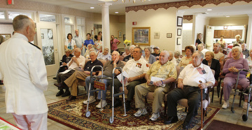 Admiral Kenneth Monroe Carr, 88,of Chagrin Falls,  tells of his 46-year military service to residents of Windsor House.