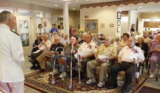 Admiral Kenneth Monroe Carr, 88,of Chagrin Falls, tells of his 46-year military service to residents of Windsor House.