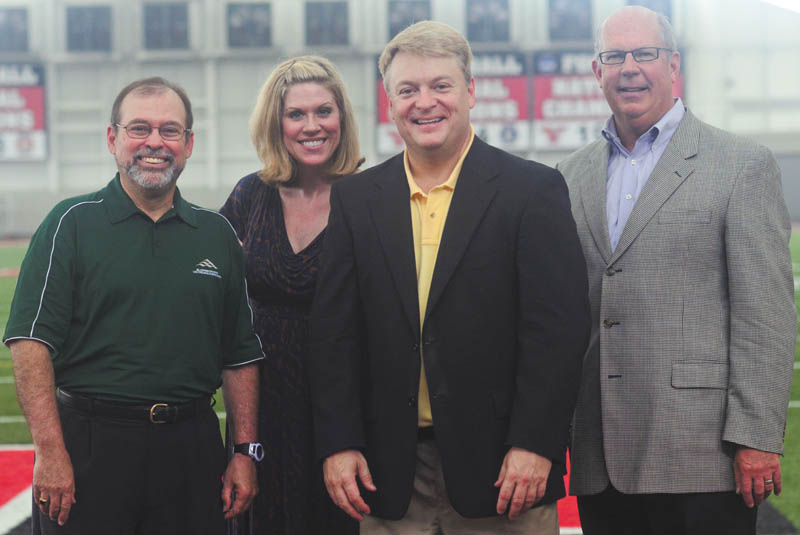 Spreading awareness about the 2013 Youngstown Area Heart Walk are, from left, T.J. Meister from WBBG; Allison Oltmann, Heart Walk director; Dave Sess, from WKBN-TV 27; and Doug Sweeney, chairman of the Heart Walk. The walk will take place Sept. 21 at the WATTS at Youngstown State University and has a fundraising goal of $250,000. NANCY URCHAK | SPECIAL TO THE VINDICATOR