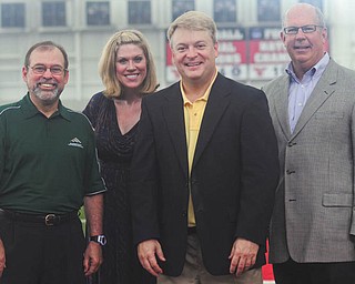 Spreading awareness about the 2013 Youngstown Area Heart Walk are, from left, T.J. Meister from WBBG; Allison Oltmann, Heart Walk director; Dave Sess, from WKBN-TV 27; and Doug Sweeney, chairman of the Heart Walk. The walk will take place Sept. 21 at the WATTS at Youngstown State University and has a fundraising goal of $250,000. NANCY URCHAK | SPECIAL TO THE VINDICATOR