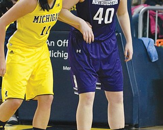 Canfield High graduate Kate Popovec finished her college basketball career at Northwestern. She’s the new
director of basketball operations for the LaSalle University women’s team.