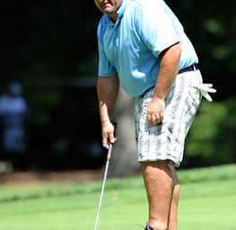 Golfer Jay Monigold of Salem reacts after pushing a putt wide of the cup on the 9th hole on the north course Friday afternoon at Mill Creek Golf Corse part of the Vindy Greatest Golfer on August 23, 2013.