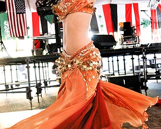 MADELYN P. HASTINGS | THE VINDICATOR..Ameera Paone belly dances at the Arab American Community Festival in downtown Youngstown on Saturday, August 24, 2013.... - -30-..