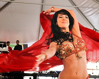 MADELYN P. HASTINGS | THE VINDICATOR..Ameera Paone belly dances at the Arab American Community Festival in downtown Youngstown on Saturday, August 24, 2013..... - -30-..