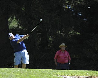 Golfer Jason Andre of Liberty tees off on the 9th hole Saturday afternoon at Youngstown Country Club as part of the Vindy Greatest Golfer tournament on August 24.