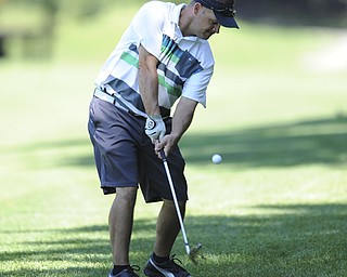 Golfer Corbin Gregorino of North Lima chips his ball out of the short rough and onto the fair way on the 8th hole Saturday afternoon at Youngstown Country Club as part of the Vindy Greatest Golfer tournament on August 24.