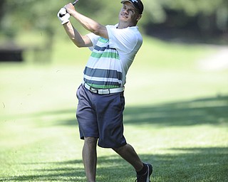 Golfer Corbin Gregorino of North Lima chips his ball out of the short rough and onto the fair way on the 8th hole Saturday afternoon at Youngstown Country Club as part of the Vindy Greatest Golfer tournament on August 24.